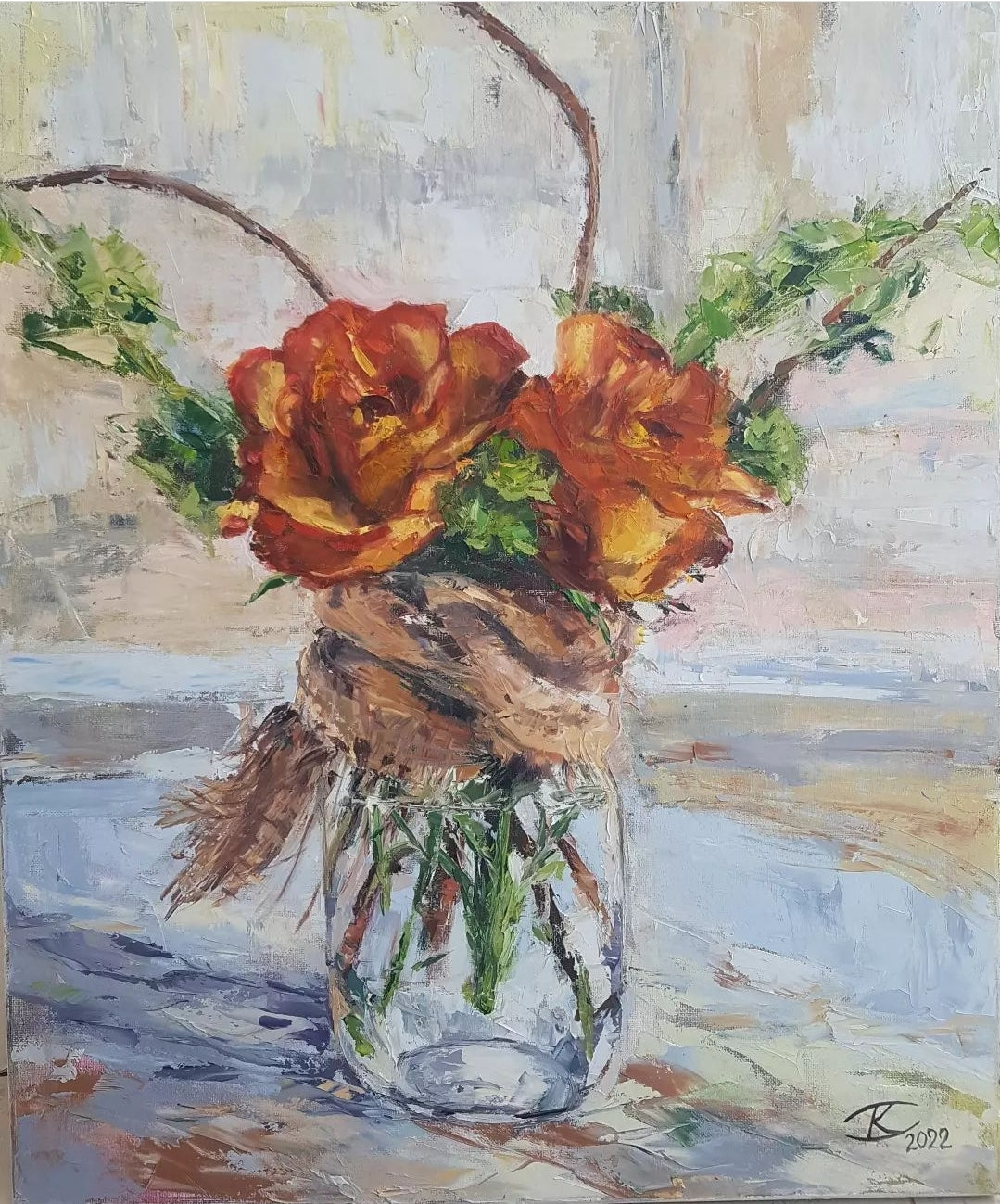 Two roses in a glass